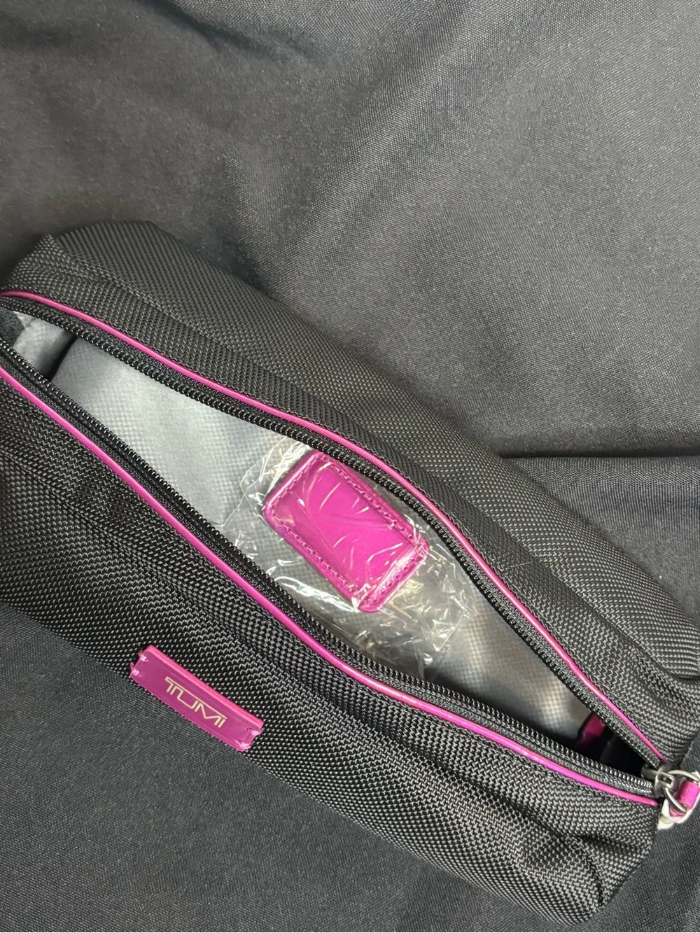 Tumi Black Travel Pouch with Pink Accents